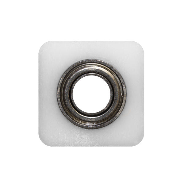 Square white non-marring bearing with metal circular center, 3/4 inch size.
