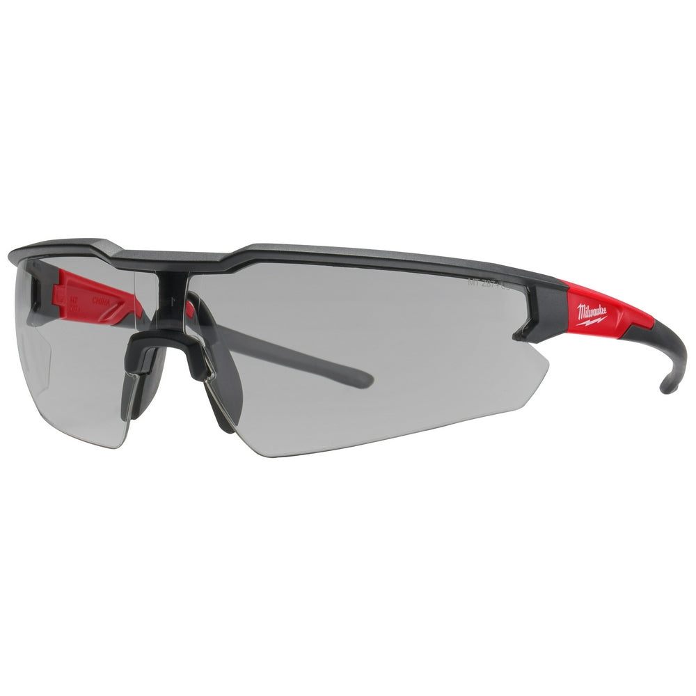Safety glasses with gray lenses, black frame, and red accents on the temples.