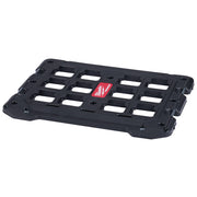 Black rectangular PACKOUT mounting plate with grid of rectangular slots and mounting holes around edges.