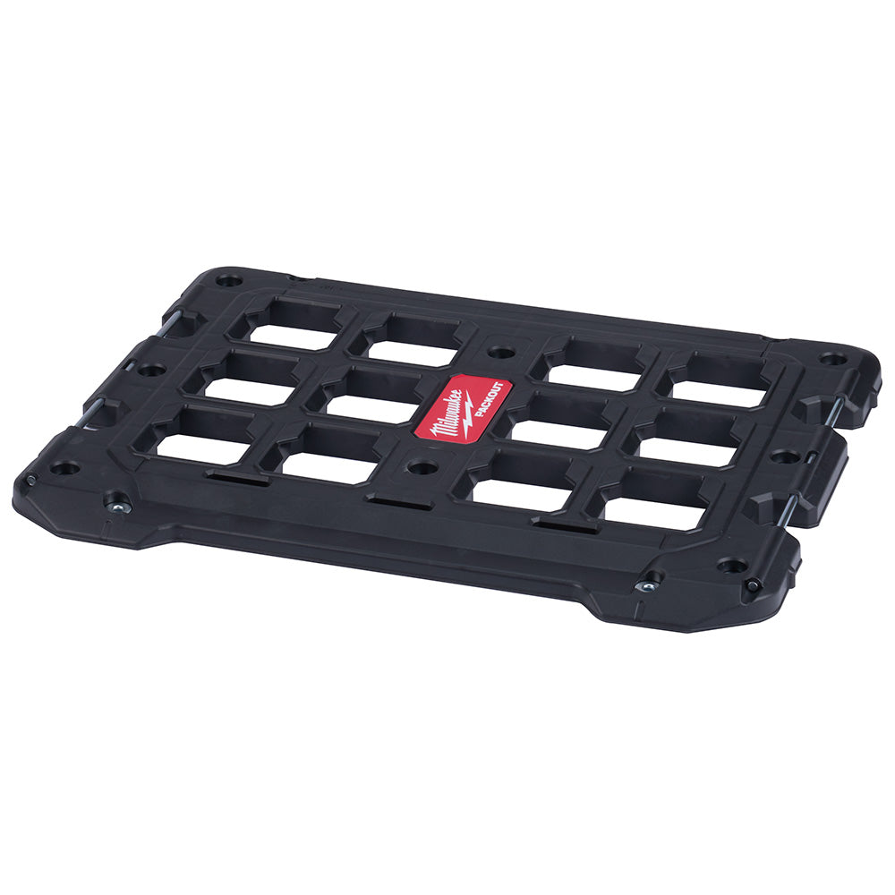 Black rectangular PACKOUT mounting plate with grid of rectangular slots and mounting holes around edges.