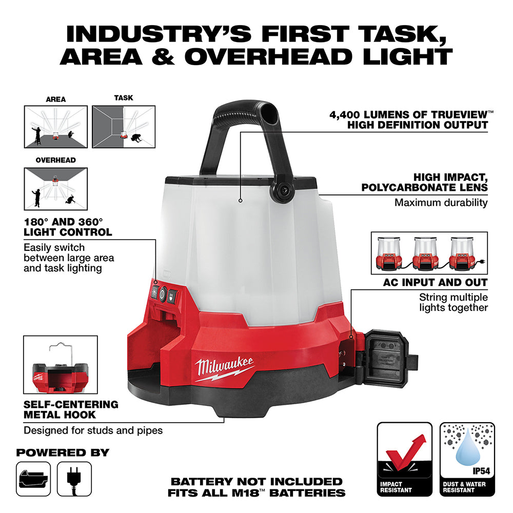 Milwaukee M18 RADIUS compact LED site light with red base, white dome shade, and black handle on top.