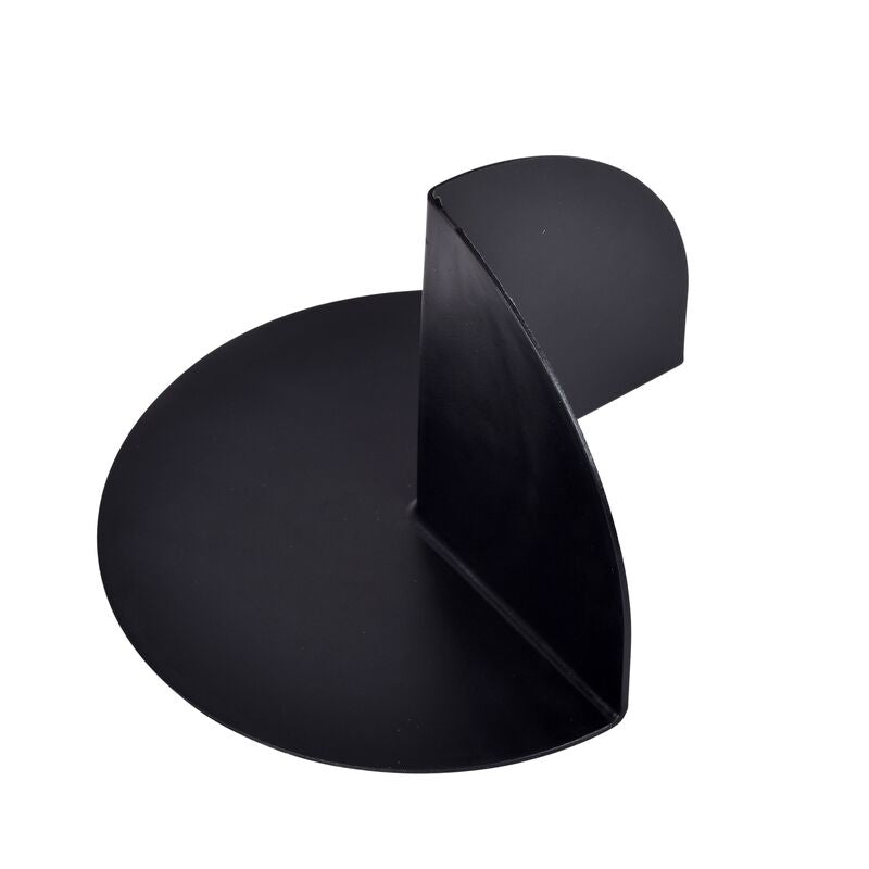 Black plastic corner dam with curved rounded edges and angled interior fold for shower pan waterproofing.