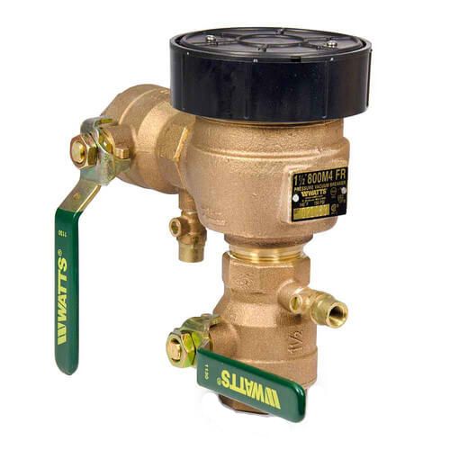 Brass pressure vacuum breaker with black cap, green handles, and inlet/outlet connections.