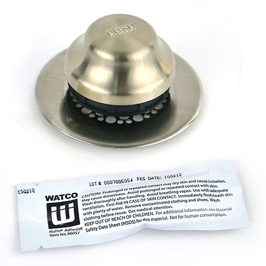 Brushed nickel dome-shaped tub stopper with integrated grid strainer and black rubber seal ring.