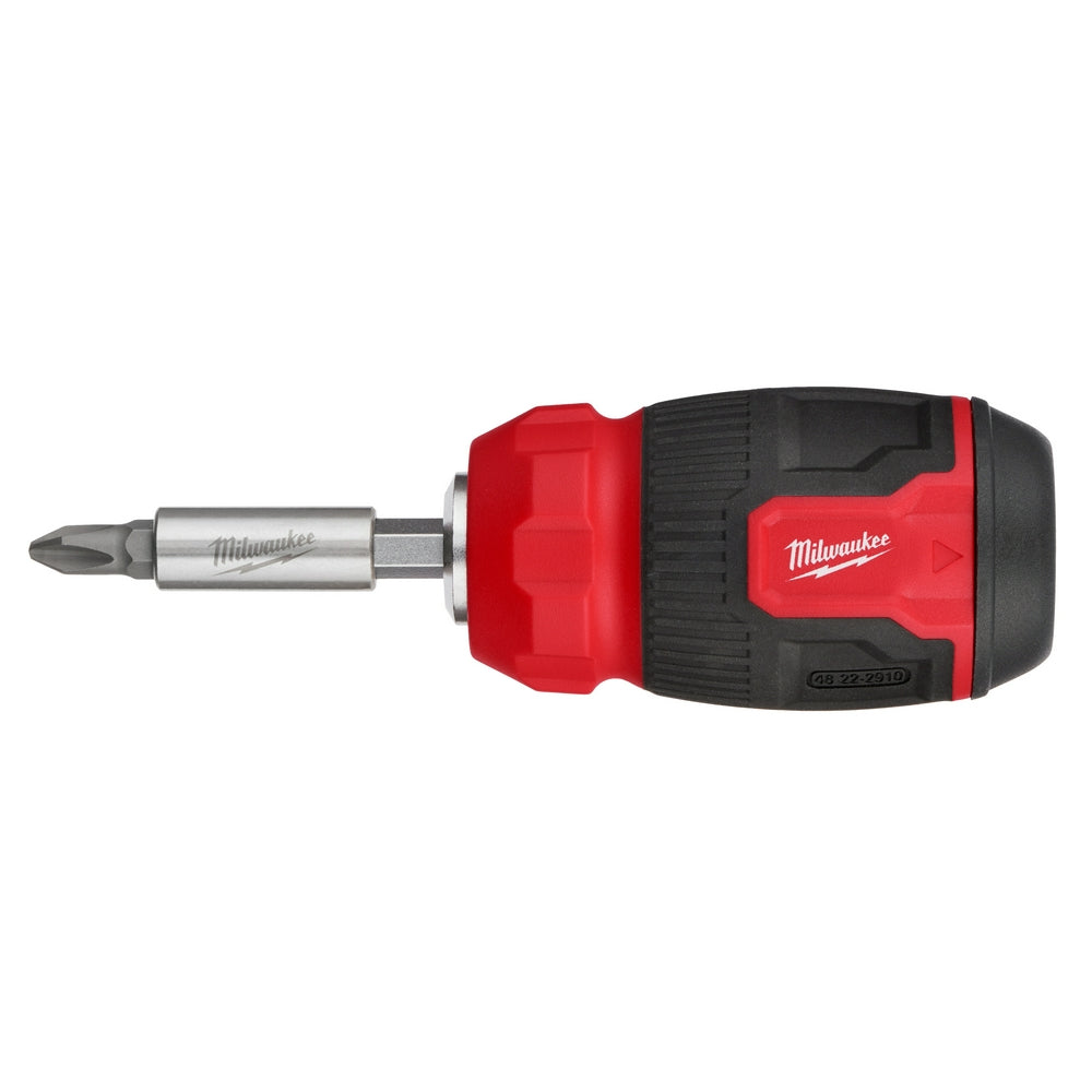 Milwaukee compact multi-bit screwdriver with red and black handle and metal shaft with Phillips bit.