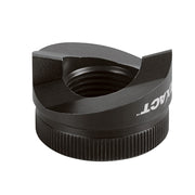 Black metal sink punch tool with cylindrical ribbed base and curved cutting head with central opening.