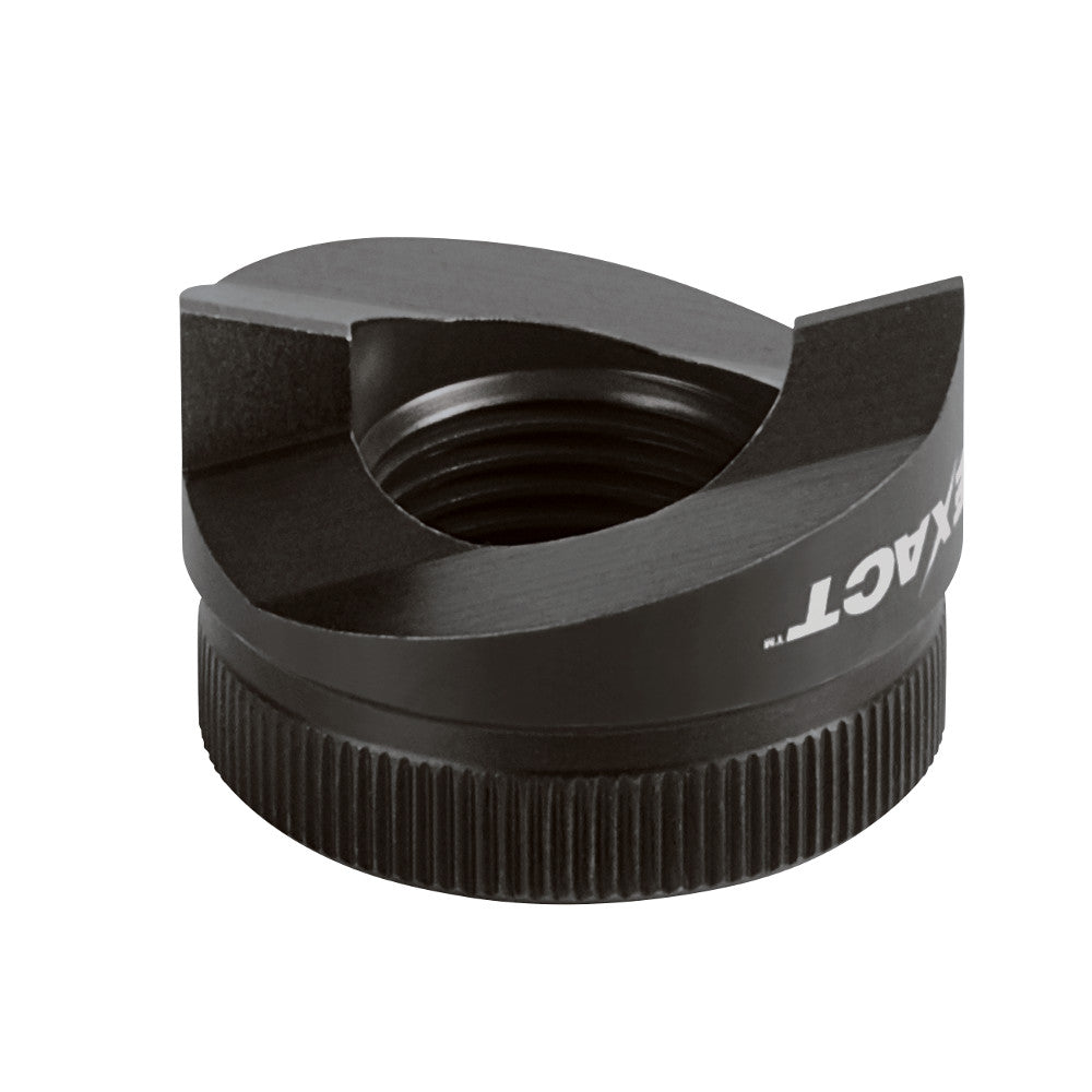 Black metal sink punch tool with cylindrical ribbed base and curved cutting head with central opening.