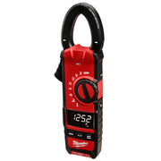 Red and black Milwaukee clamp meter with digital display showing 1252 amperes, rotation dial, and black clamp jaw at top.