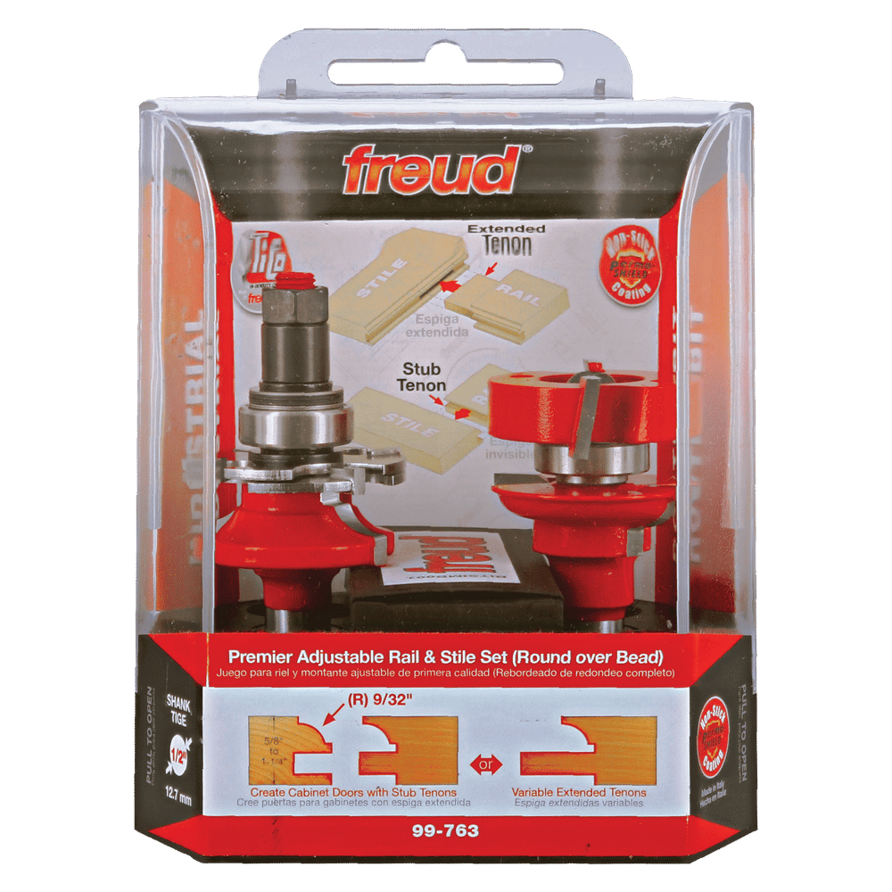 Freud Premier Adjustable Rail & Stile bit set with red router bits and wooden sample pieces showing round over bead profiles.