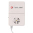 White rectangular flood alert device with circular sensor pad and attached cord.