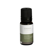 Small dark glass bottle with black screw cap and white and green label reading "Evergreen" with ingredient list.