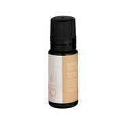 Small glass bottle with tan and white label, black screw cap, containing orange chakra oil.
