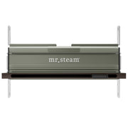Oil-rubbed bronze linear steam head with horizontal finned design and aroma tray slot, mounted on dark base plate.