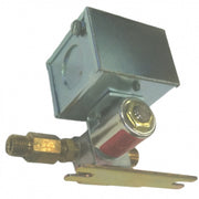 Metal solenoid valve with gray coil housing, brass connector port, and red indicator on side.