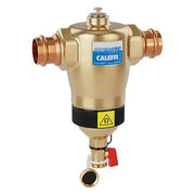 Brass DirtMagPRO magnetic separator with copper press connections, drain valve, and red shutoff lever.
