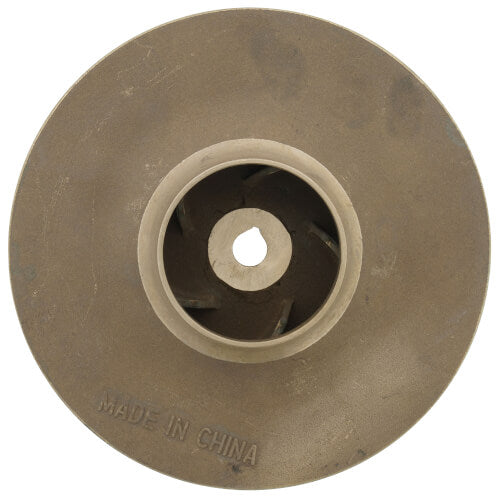 Brass impeller with 5-1/4 inch diameter and center hub with curved internal blades visible.