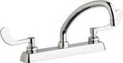 Chrome deck mount faucet with curved spout and wristblade handles, 8-inch centers.