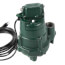 Green Zoeller submersible effluent pump with cord attachment and rectangular housing.