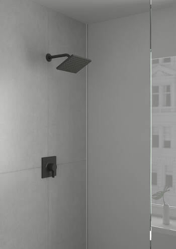 Matte black square shower trim with wall-mounted pressure balance valve and overhead rainfall showerhead.