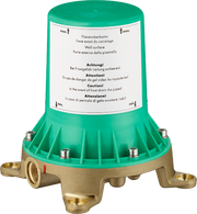 Starck Rough freestanding tub filler with green cap, brass base, and instructional label visible on cylindrical housing.