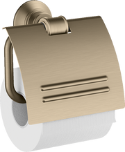 Brushed nickel toilet paper holder with covered roll design and mounting bracket.