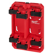 Red PACKOUT tool rack with four black sliding handle grips and mounting slots.