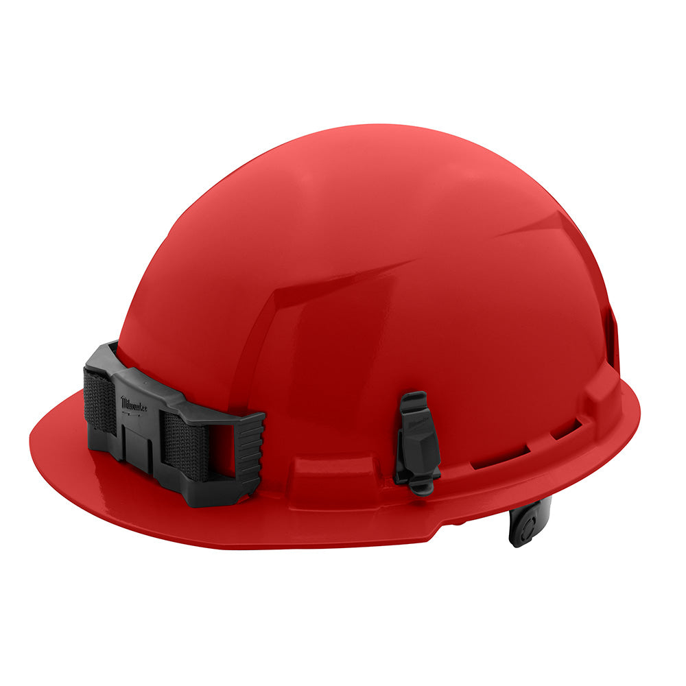 Red hard hat with front brim, black suspension system, and ratcheting adjustment mechanism.