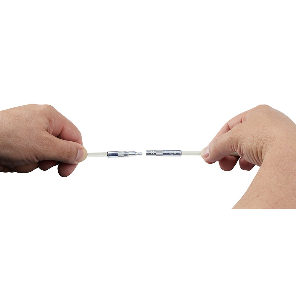 Two hands holding a flexible white fish stick with metal connectors at each end.