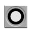 Grey square wall plate with black circular opening for Rinnai retrofit installation.