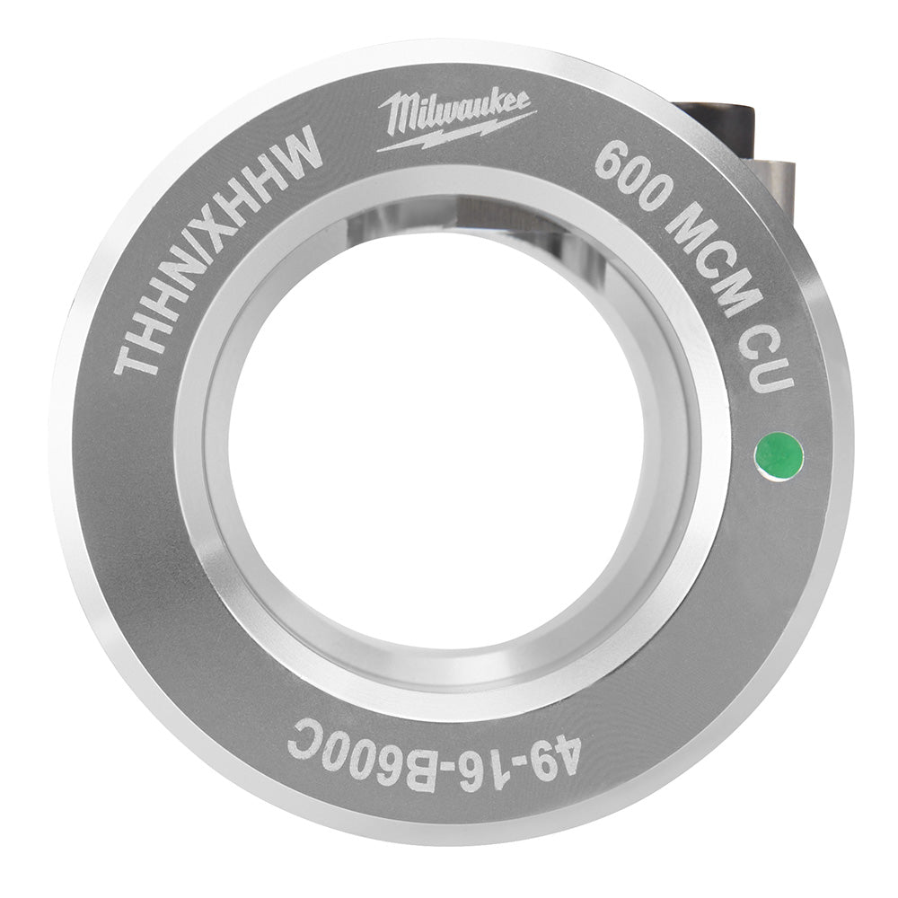 Gray and white Milwaukee electrical bushing with central opening, labeled THHN/XHHW 600 MCM CU with green indicator dot.