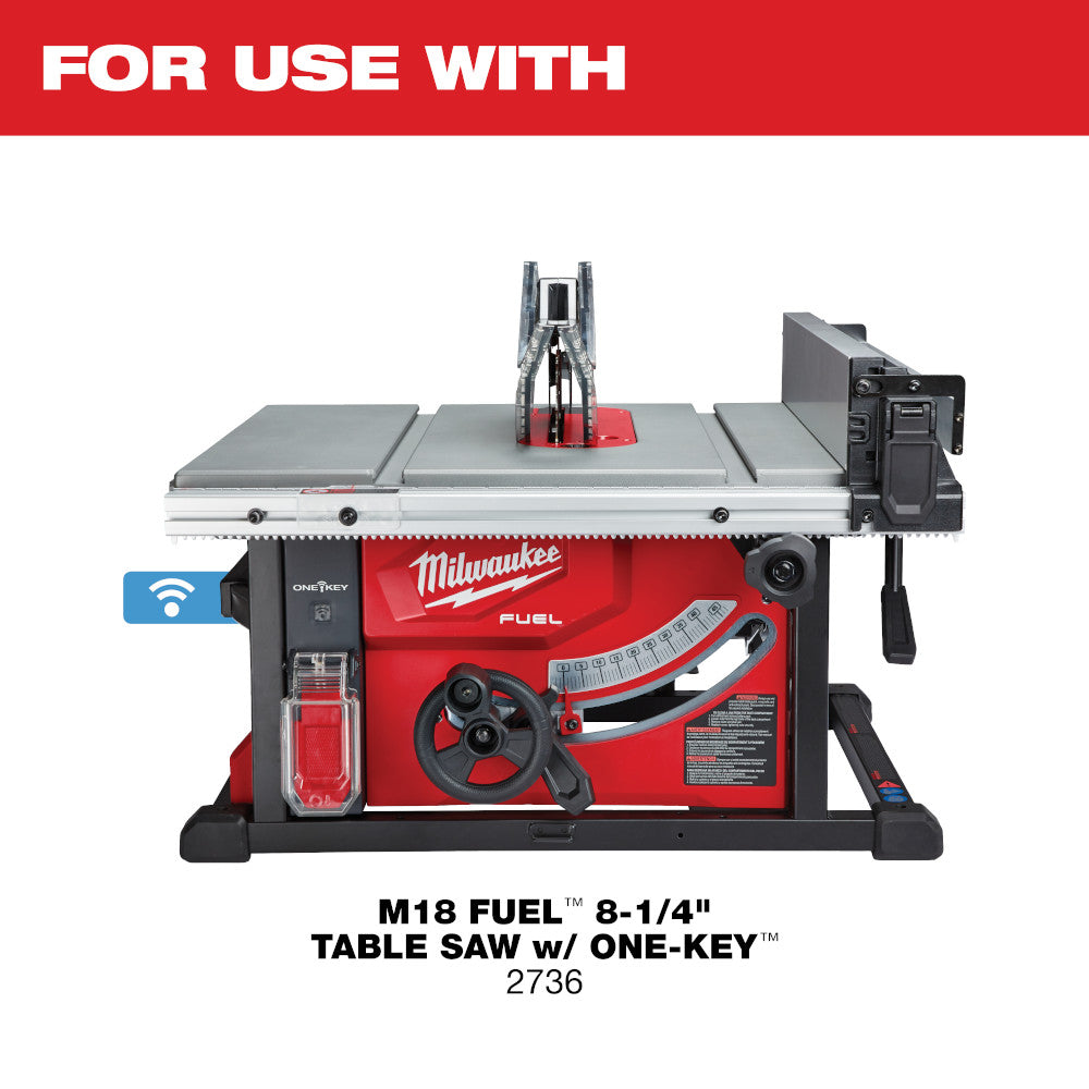 Red and black Milwaukee folding table saw stand with gray work surface and control wheel on front.