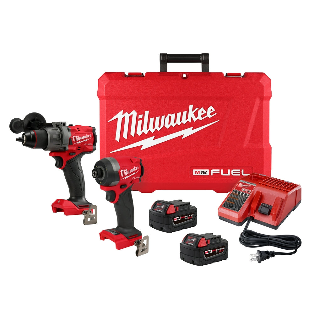 Milwaukee M18 FUEL combo kit with drill, impact driver, two batteries, charger, and red carrying case.