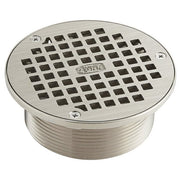 Round stainless steel strainer with square openings and threaded base, secured with screws.