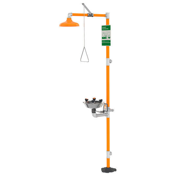Stainless steel safety station with orange post, overhead shower head, wide-area eye wash basin, and instruction signage.