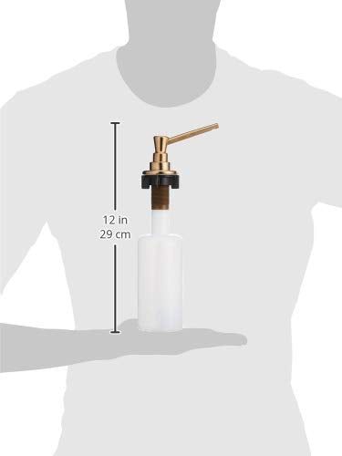 Champagne bronze soap dispenser pump with white bottle shown at 12 inches tall next to human figure for scale.