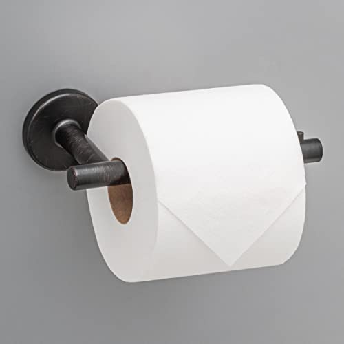 Venetian bronze tissue holder with cylindrical rod mounting and white toilet paper roll installed.