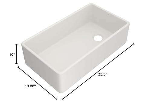 White fireclay farmhouse apron front sink with single bowl and drain hole, measuring 35.5" wide by 19.88" deep by 10" high.