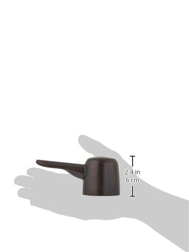 Venetian bronze metal lever handle with rounded cap and curved arm, shown held in hand with 2.4 inch height measurement.