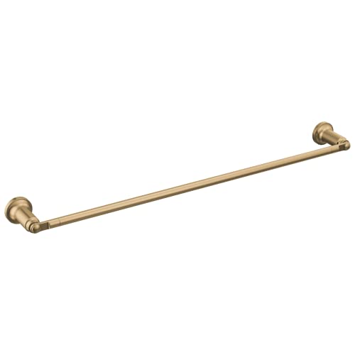 Champagne bronze towel bar with decorative end caps mounted horizontally.