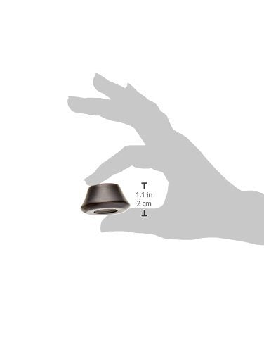 Venetian bronze faucet aerator with 1.1 inch diameter shown in hand for scale.