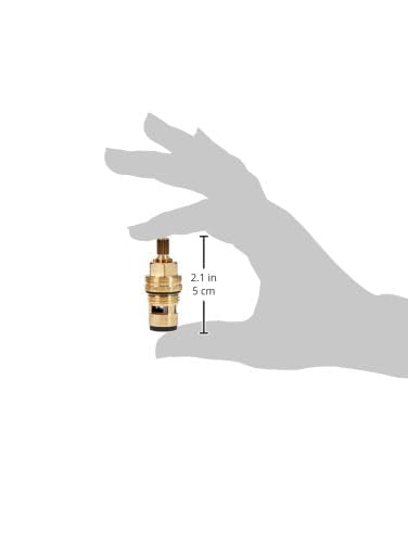 Grohe ceramic cartridge repair part with brass body and measurement scale showing 2.1 inches height.
