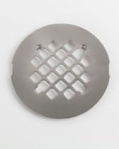 Round satin brass shower drain plate with grid pattern openings, viewed from above.