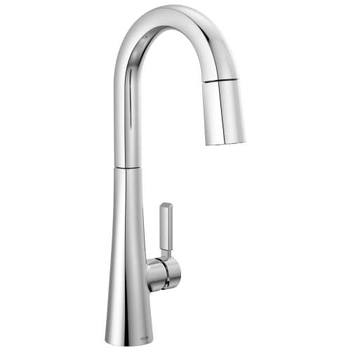 Chrome single-handle pull-down faucet with curved spout and spray nozzle.