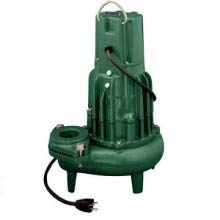 Green Zoeller submersible effluent pump with black power cord and mounting base.