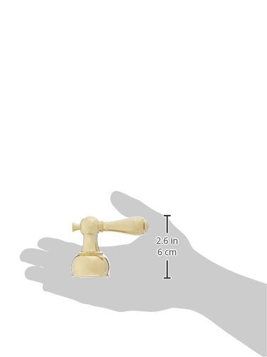 Polished brass metal lever handle with round base, 2.6 inches tall, displayed in hand.