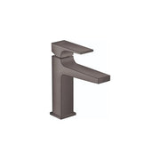 Brushed black chrome single-hole bathroom faucet with tall rectangular body, lever handle, and curved spout.