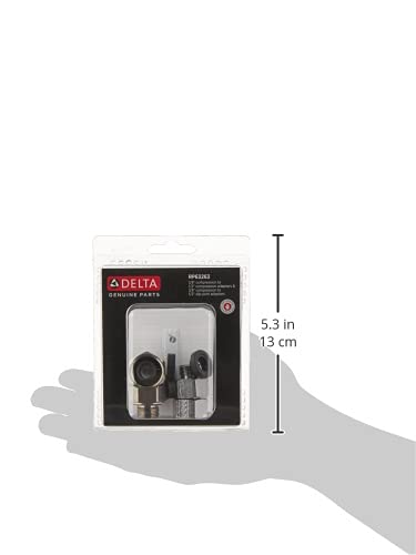 Delta adapter kit with PEX compression fittings in clear clamshell packaging on hand scale, 5.3 inches tall.