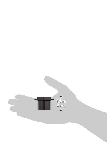 Silver wrench with small black cylindrical fitting held in palm, 1.5 inches or 3 cm wide.