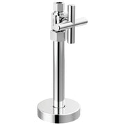 Chrome supply stop valve with cross handle and circular base mounted on vertical pipe.