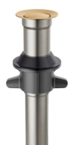Champagne bronze push pop drain with stainless steel body and black rubber base, shown from above.